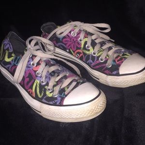 Cute black converse with a print.